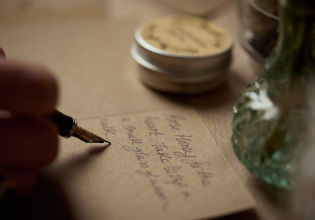 Blog 2 Writing ingredients in a notebook