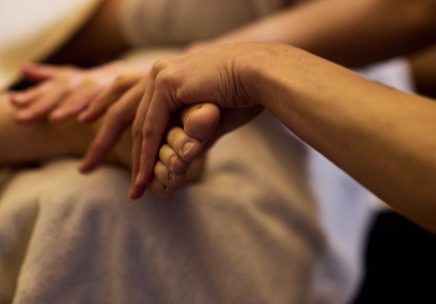 Reflexology 1 A hand massages a foot for Reflexology